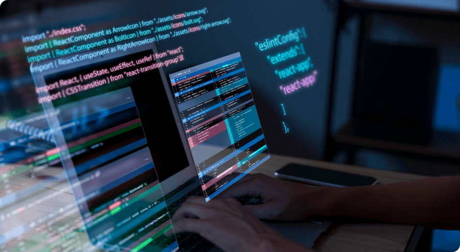Software development workspace with multiple screens showing code