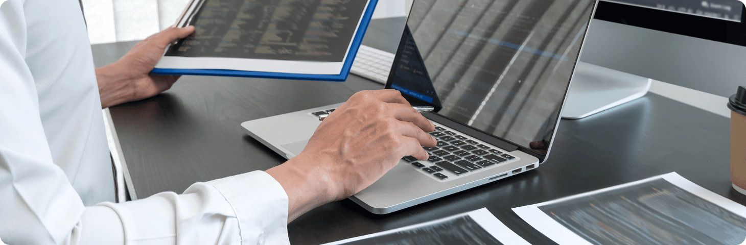 Business team working on laptops